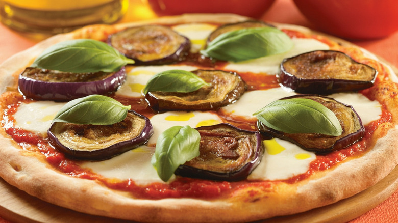 Grilled eggplant slices on a white dish