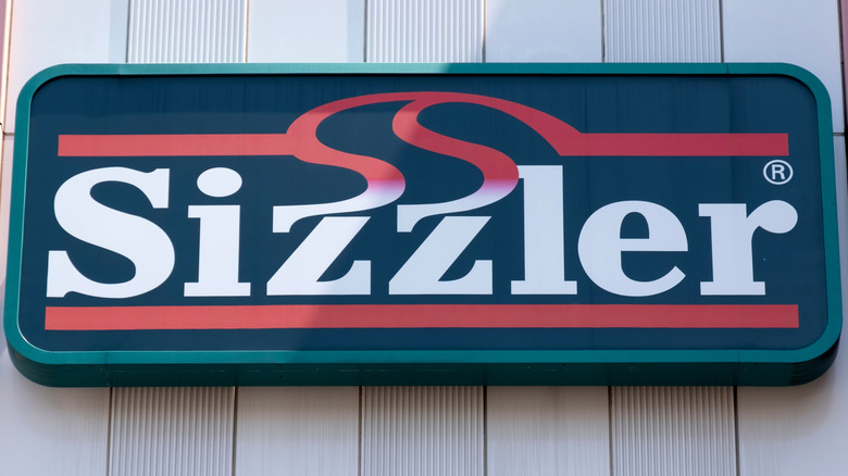 Sizzler sign on outside of restaurant