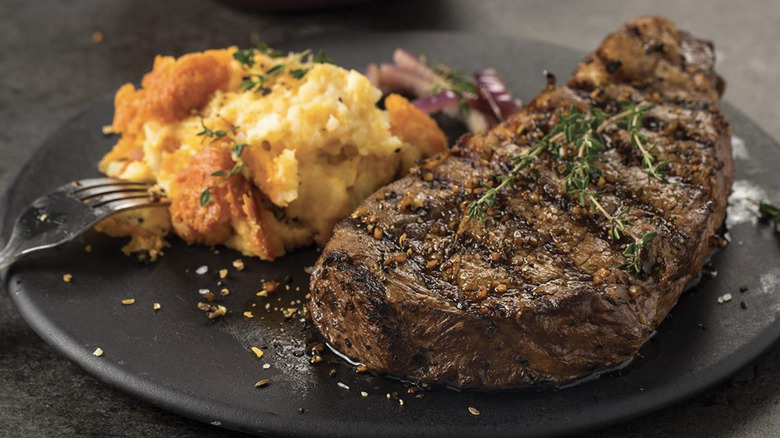 Delmonico steak with potatoes