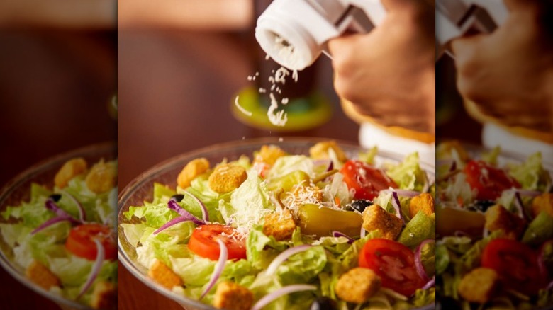 Cheese grated on Olive Garden's house salad