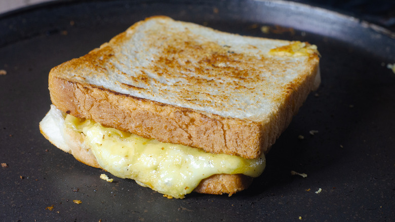 A grilled cheese sandwich cooking