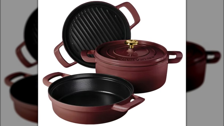 Three-piece set of Tramontina cookware on white background