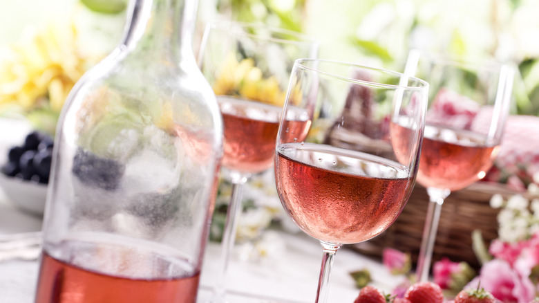 Glasses and bottle of chilled rose wine