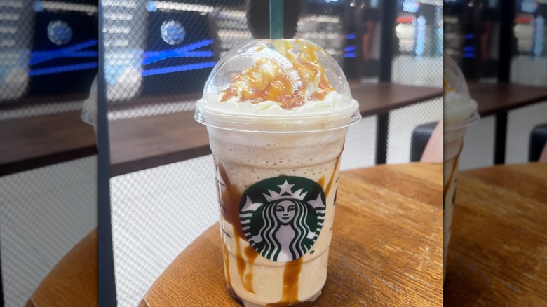 starbucks frappuccino with caramel drizzle and whipped cream