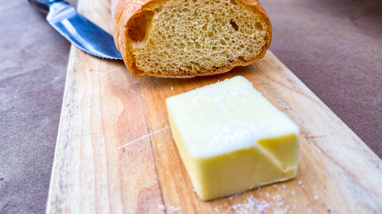 butter on cutting board with knife