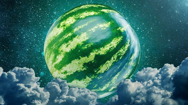 A watermelon seen in a dark starry sky above clouds