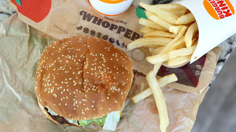 Top view of a Burger King Whopper and fries