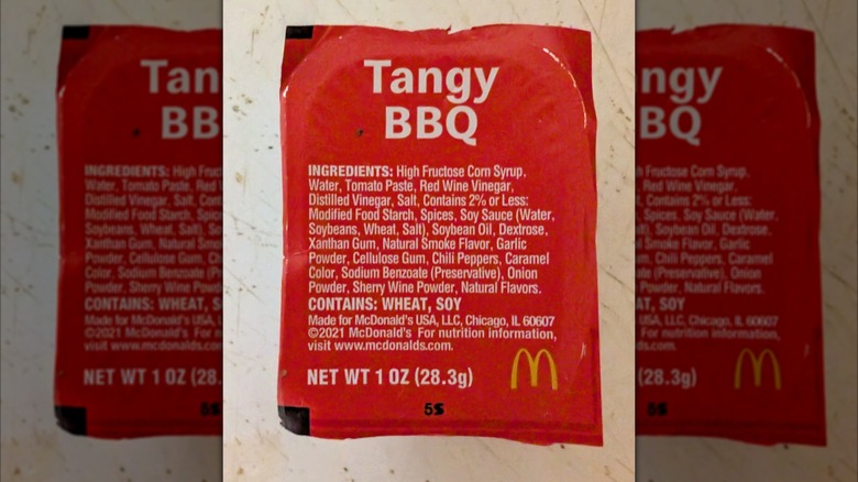 An unopened cup of Tangy BBQ sauce from McDonald's