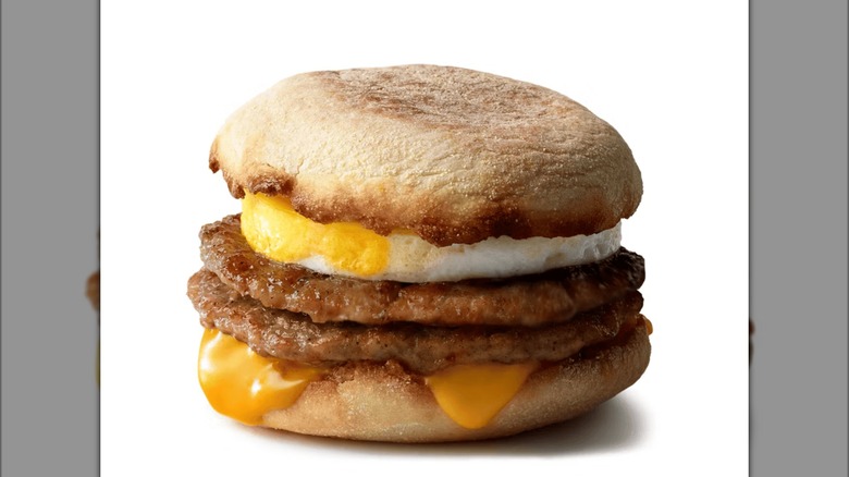 A double Sausage and Egg McMuffin with one slice of cheese from McDonald's.