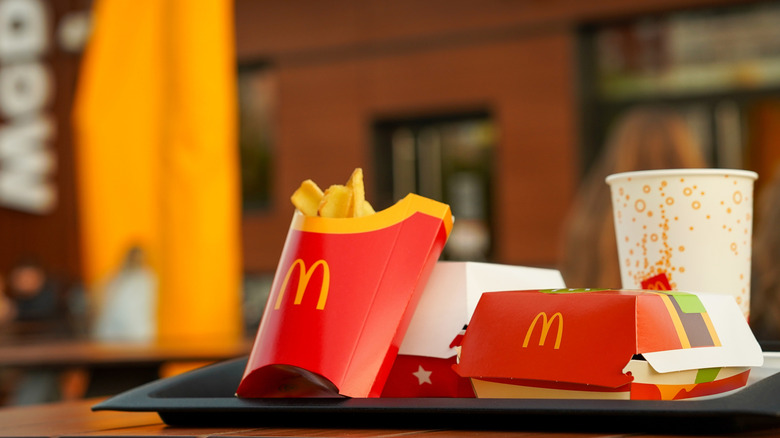 A McDonald's meal sitting on a table outside