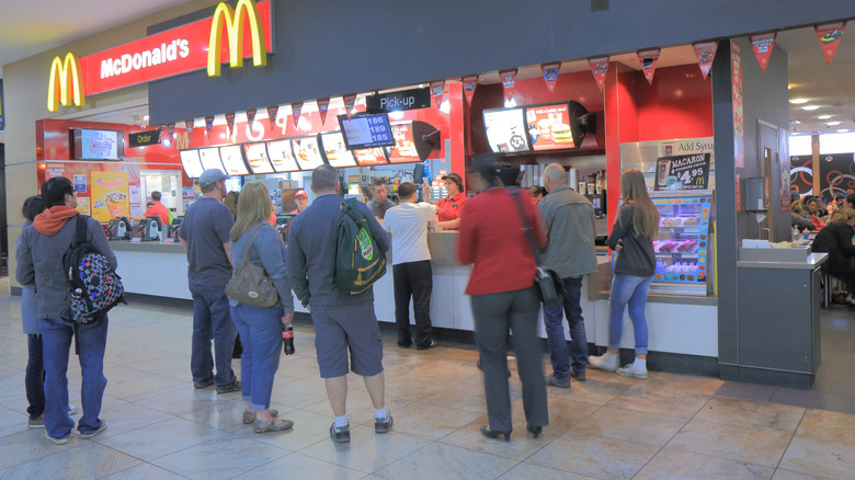 People in line to buy food from McDonald's