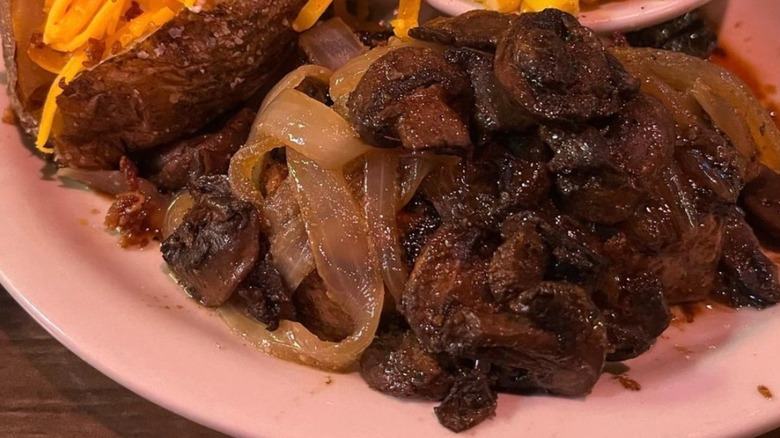 Texas Roadhouse steak with mushrooms and onions