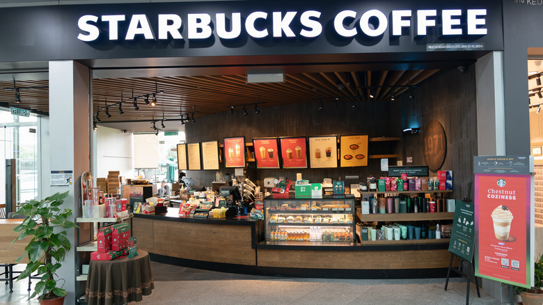 A Starbucks Coffee counter inside of a retail building