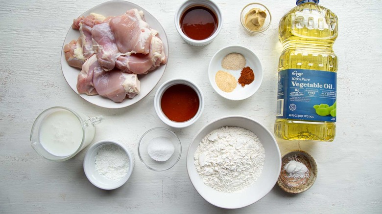raw chicken, oil, flour, and other ingredients