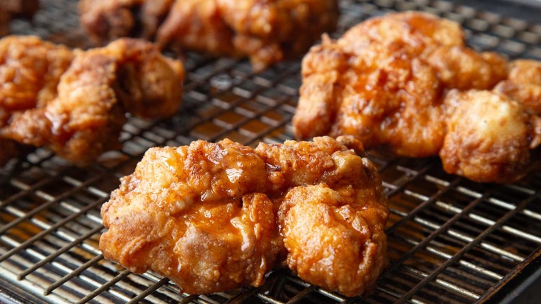 fried chicken strips on wire rack