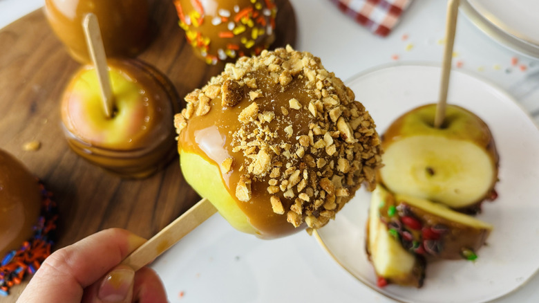 Peanut coated caramel apple