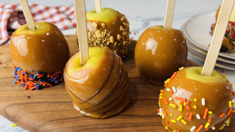 Caramel apples on serving board