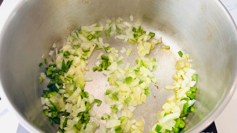 Diced onion and jalapeno in pot