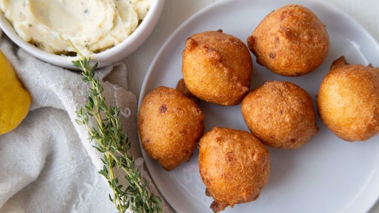 fried hush puppies on plate