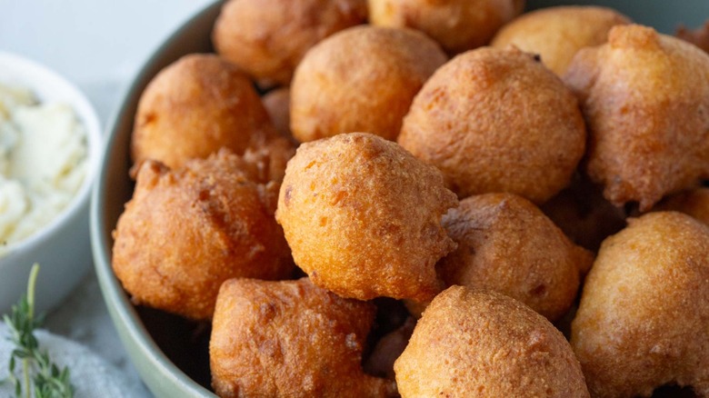 closeup fried hushpuppies in bowl