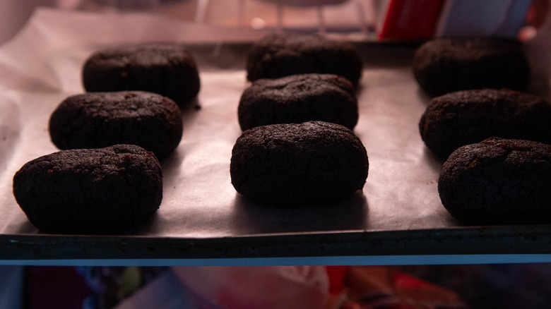 egg-shaped chocolate cake in a freezer