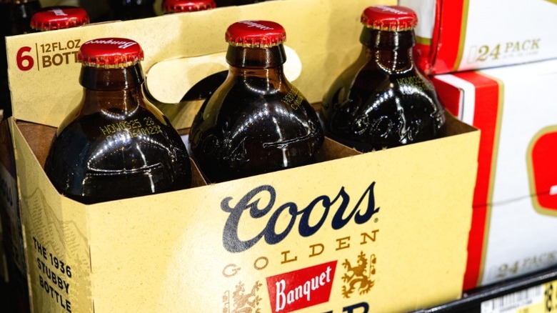 A pack of Coors Banquet beer bottles.