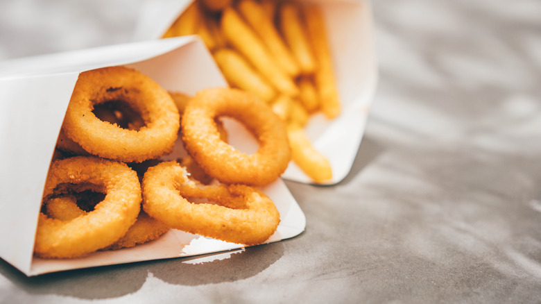 Fast food onion rings served in a paper bag