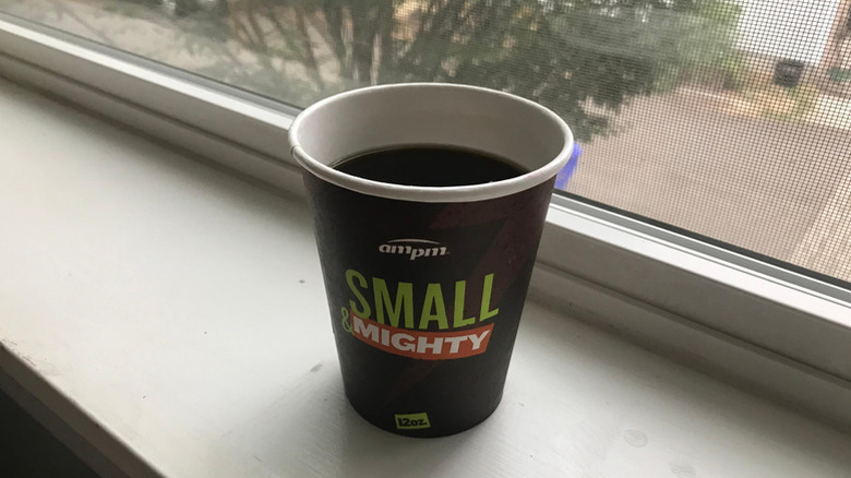coffee in cup on windowsill