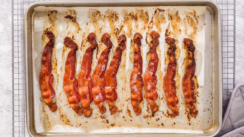 Cooked bacon on a baking sheet