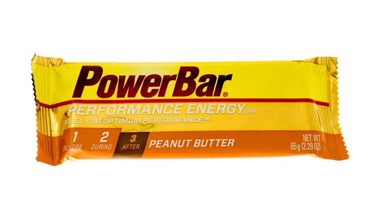 A peanut butter PowerBar placed on a white background.