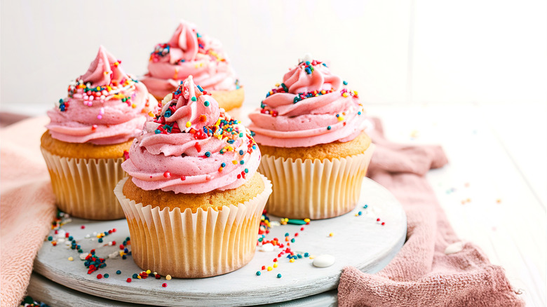 frosted cupcakes with sprinkles