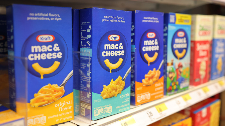 Boxes of Kraft mac and cheese on store shelf