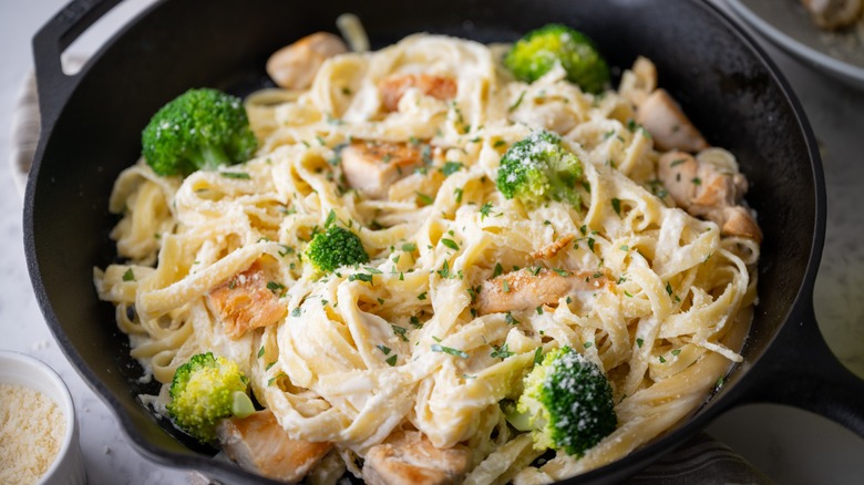 Skillet of fettucine with chicken and broccoli