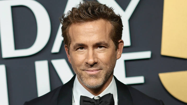 Ryan Reynolds smiling at an event
