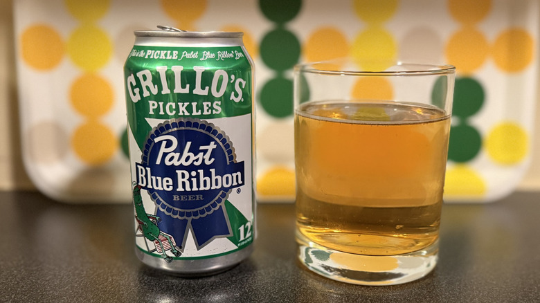 A can and glass of PBR x Grillo's Pickle Beer