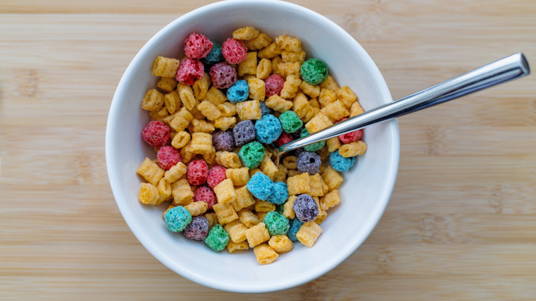 CrunchBerries cereal in bowl with spoon
