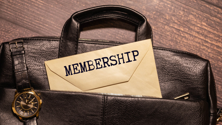 membership envelope in a leather briefcase