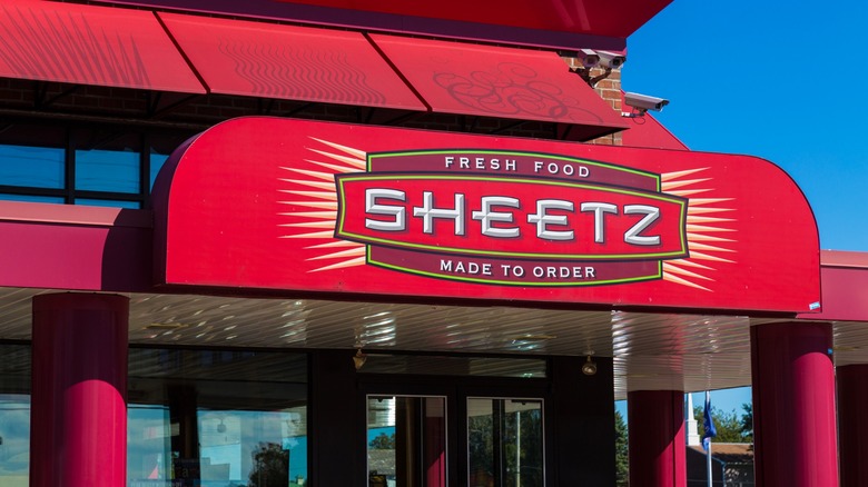 A red awning designates the entrance to Sheetz convenience store