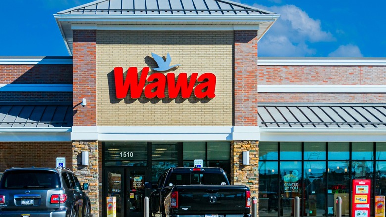 Cars park outside a Wawa convenience store