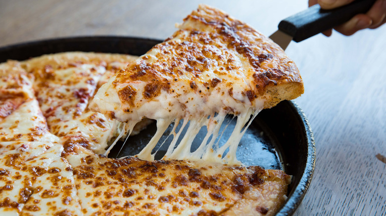 A closeup of a slice of cheese pan pizza at Pizza Hut