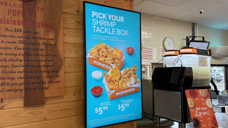 Shrimp Tackle Box sign inside a Popeyes