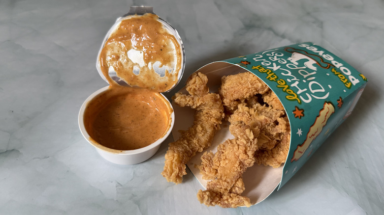 close up of Popeyes' Chicken Dippers and Signature Sauce