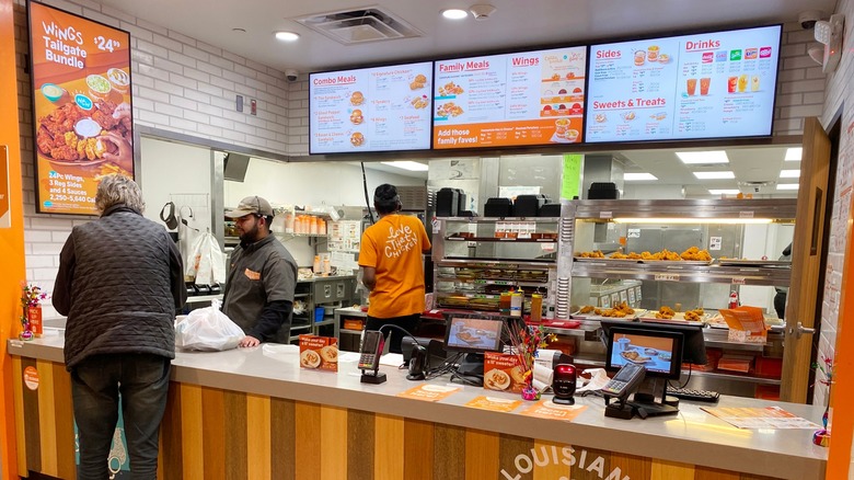 Customer ordering from Popeyes