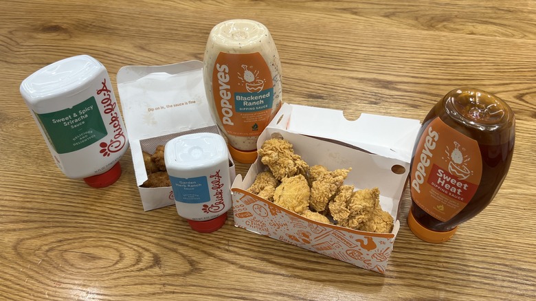 four bottles and boxes of chicken nuggets
