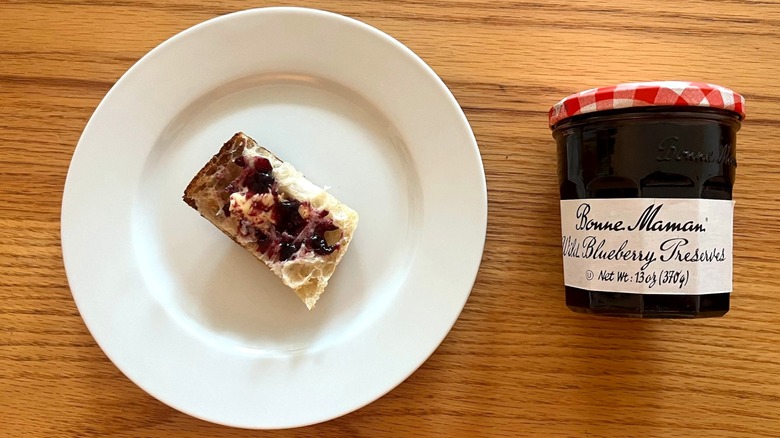 Bonne Maman Wild Blueberry preserves smeared on baguette