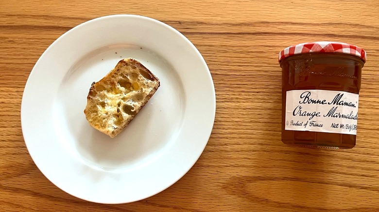 Bonne Maman Orange Marmalade in a jar and on a piece of toast