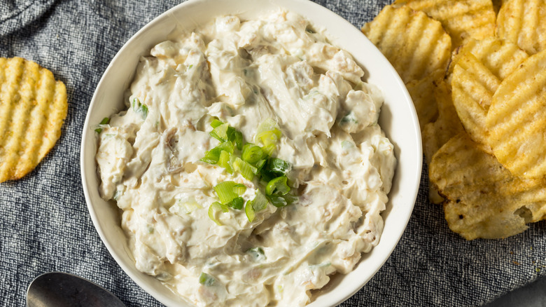 Clam dip served with ruffled potato chips