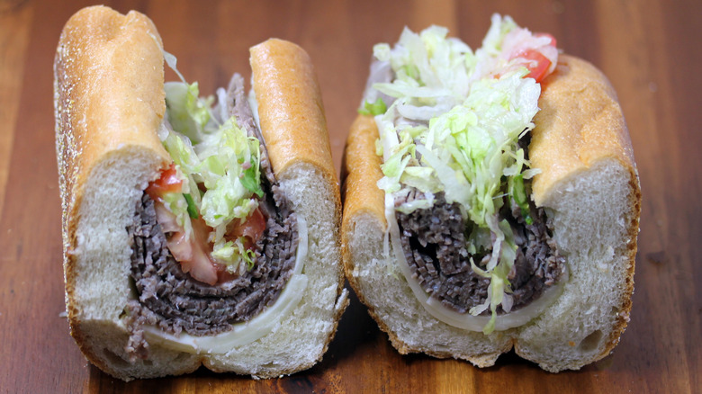 a Wawa roast beef hoagie sliced in half