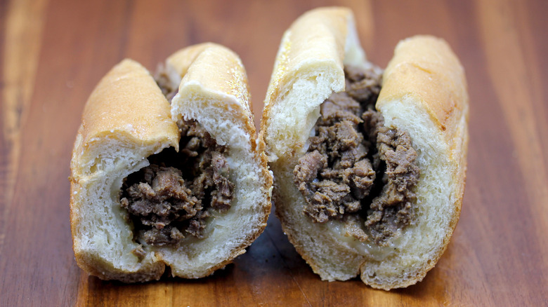 a Wawa cheesesteak hoagie, sliced in half