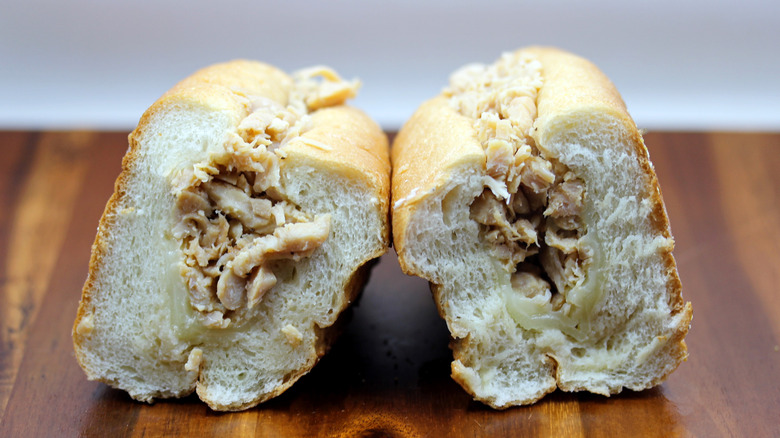 a Wawa chicken cheesesteak sliced in half